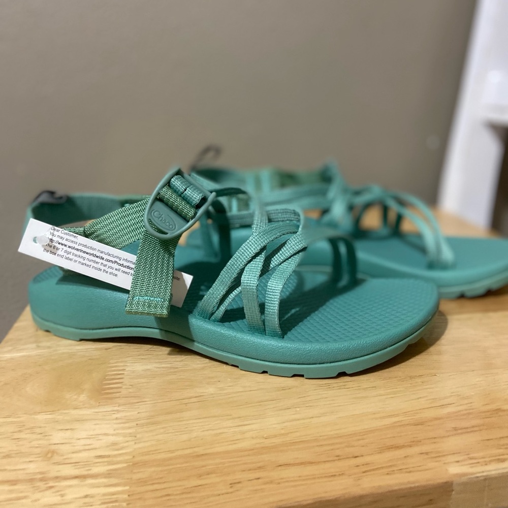 Mint green chacon. Size 5 youth, 7 women. Brand new. Tags still on them.